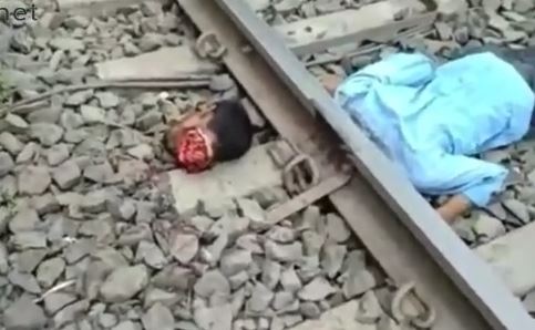 Gore video- Young man cut off his head by train