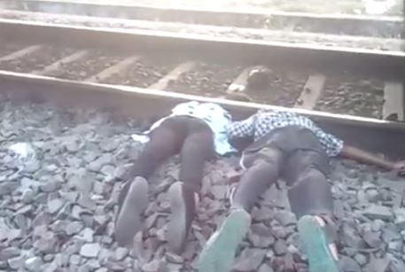 Gore video- Couple committed suicide together by train