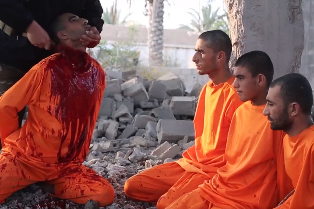 2022 gore video – Three men forced to watch Isis beheading his friend