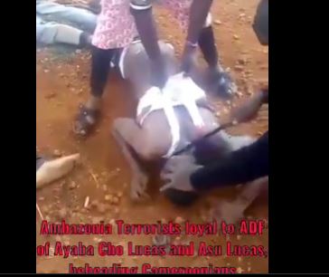 Beheading video- somewhere in CAMEROON armed men are beheading 3 dead men with knives