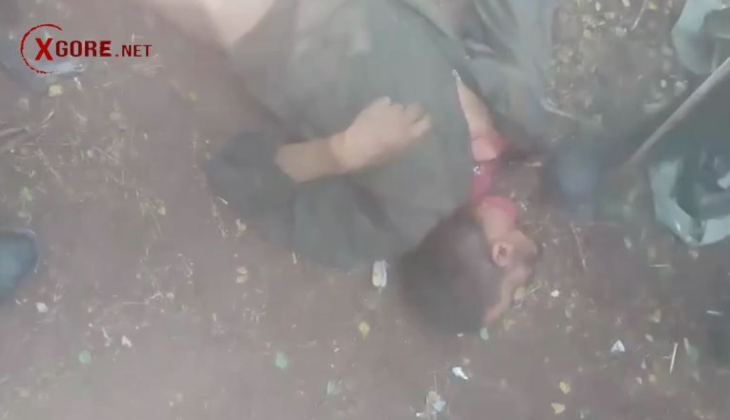 Beheading a man after a gunfight