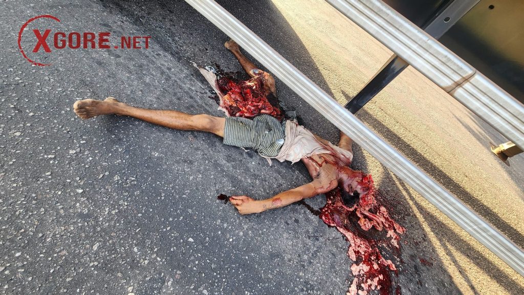 The man was run over by a tractor trailer and he was crushed