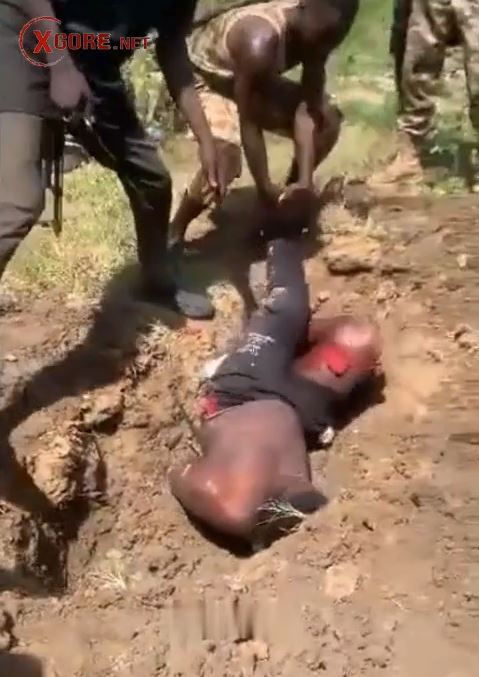 African man slit throat and shot in head