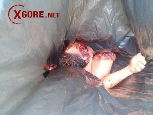 Three dismembered bodies were located inside black plastic bags. 01