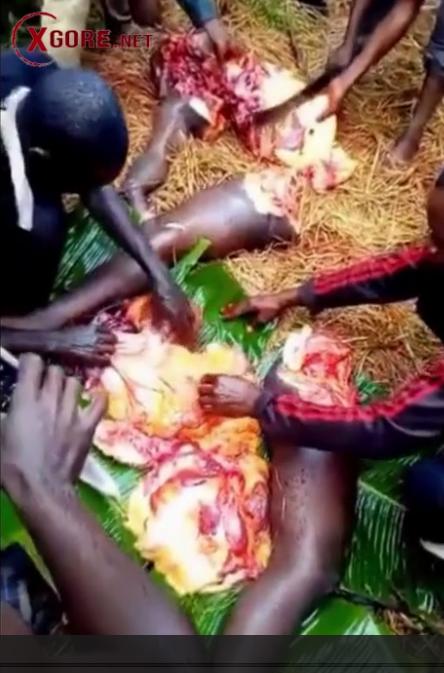 Somewhere in Africa, villagers are butchering a man