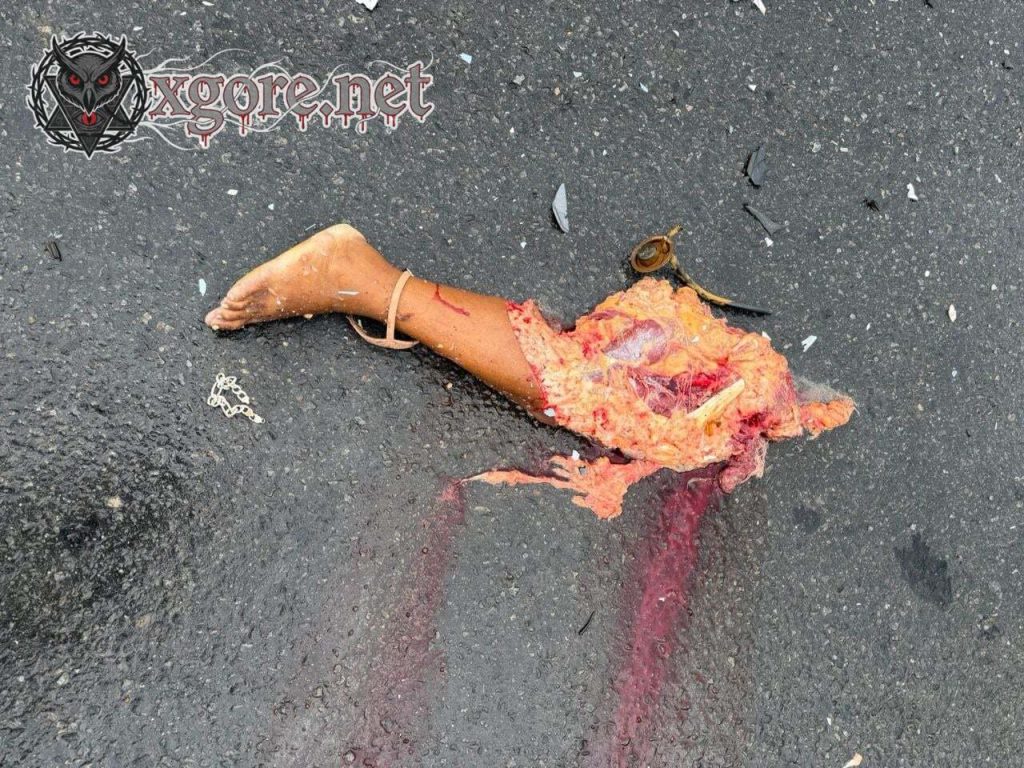 The woman’s body was crushed into a mass of flesh and one of her legs was severed 02