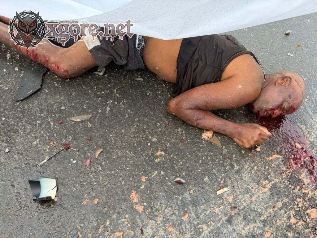 The woman’s body was crushed into a mass of flesh and one of her legs was severed 03