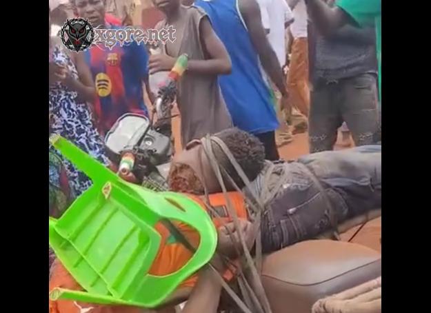 Three men were beheaded and tied to a motorcycle