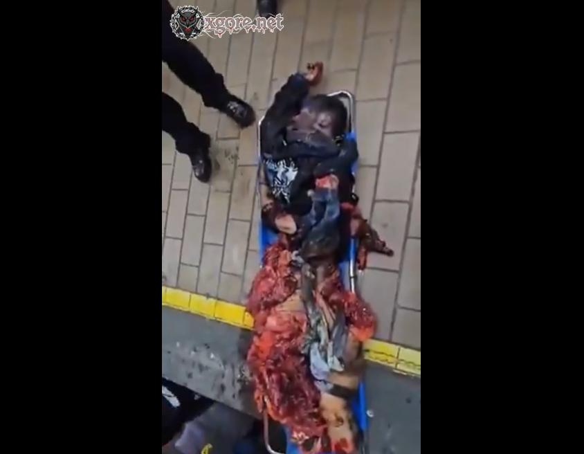 Cleaning up the corpse of a man cut into pieces by a subway train